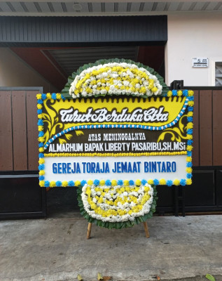 Papan Bunga Duka di Bayang